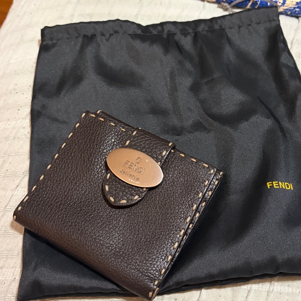 Fendi Brown Leather Selleria wallet with silver Logo Plate.  Dust bag included